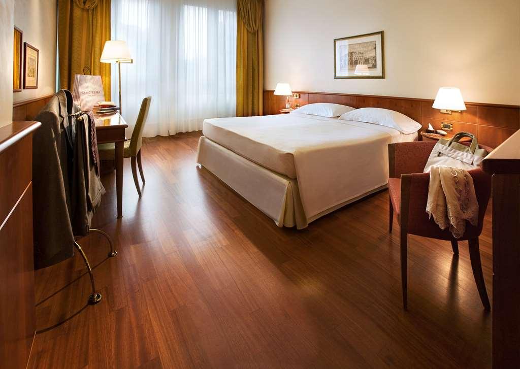 Hotel Cavour Milão Quarto foto
